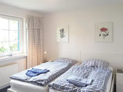 Ein Bett oder Betten in einem Zimmer der Unterkunft Mühlenpark 1 Mühlenpark Haus 3 Wo 9