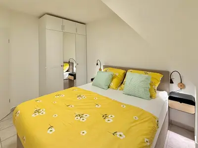 Ein Bett oder Betten in einem Zimmer der Unterkunft Eichenpark Haus 2 Wohnung 5
