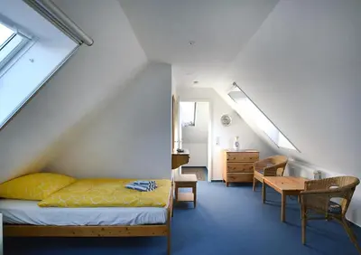Ein Bett oder Betten in einem Zimmer der Unterkunft Mühlenpark 2 Mühlenpark Haus A Wo 4