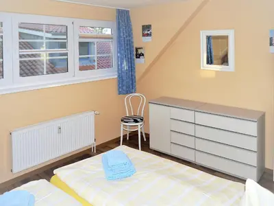 Ein Bett oder Betten in einem Zimmer der Unterkunft Mühlenpark 2 Mühlenpark Haus B Wo 10