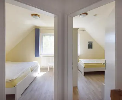 Ein Bett oder Betten in einem Zimmer der Unterkunft Ankerplatz RH 7