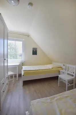 Ein Bett oder Betten in einem Zimmer der Unterkunft Ankerplatz RH 7