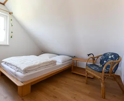 Ein Bett oder Betten in einem Zimmer der Unterkunft Haus Hühnergott