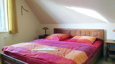 Ein Bett oder Betten in einem Zimmer der Unterkunft Im Grünnen Wo 4