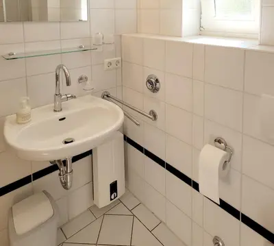 Ein Badezimmer in der Unterkunft Achterdeck