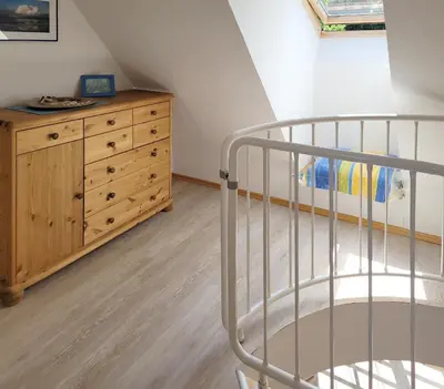 Ein Bett oder Betten in einem Zimmer der Unterkunft Achterdeck
