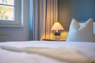 Ein Bett oder Betten in einem Zimmer der Unterkunft Mühlenpark 1 Mühlenpark Haus 5 Wo 17