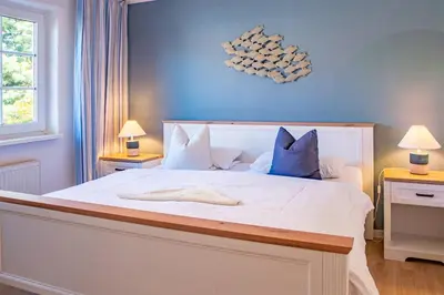 Ein Bett oder Betten in einem Zimmer der Unterkunft Mühlenpark 1 Mühlenpark Haus 5 Wo 17