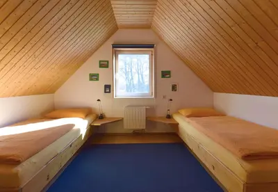 Ein Bett oder Betten in einem Zimmer der Unterkunft Meerlauschen
