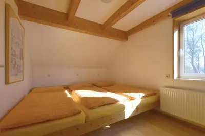 Ein Bett oder Betten in einem Zimmer der Unterkunft Meerlauschen