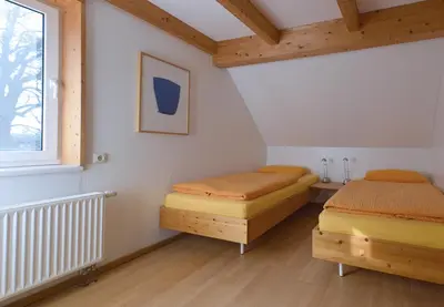 Ein Bett oder Betten in einem Zimmer der Unterkunft Meerlauschen