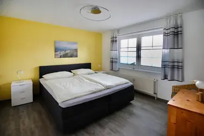 Ein Bett oder Betten in einem Zimmer der Unterkunft Mühlenpark 1 Mühlenpark Haus 1 Wo 2 