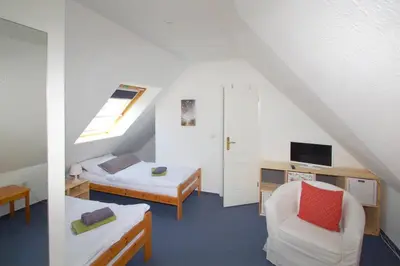 Ein Bett oder Betten in einem Zimmer der Unterkunft Mühlenpark 1 Mühlenpark Haus 2 Wo 8