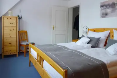 Ein Bett oder Betten in einem Zimmer der Unterkunft Mühlenpark 1 Mühlenpark Haus 2 Wo 8