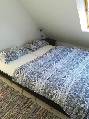 Ein Bett oder Betten in einem Zimmer der Unterkunft Mühlenpark 1 Mühlenpark Haus 5 Wo 20