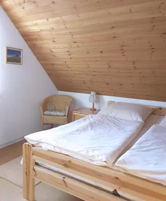 Ein Bett oder Betten in einem Zimmer der Unterkunft Hirtenstr 1 E