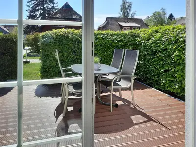 Ein Garten an der Unterkunft Am Wiesengrund Haushälfte 14