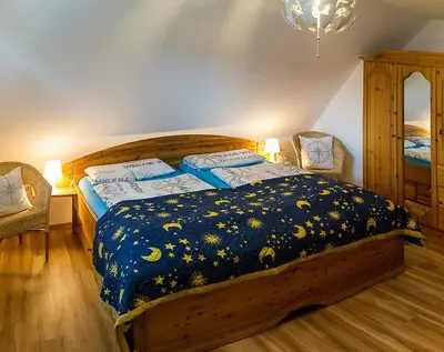 Ein Bett oder Betten in einem Zimmer der Unterkunft Am Wiesengrund Haushälfte 14