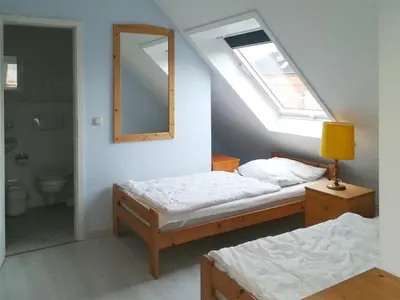 Ein Bett oder Betten in einem Zimmer der Unterkunft Mühlenpark 1 Mühlenpark Haus 2 Wo 7