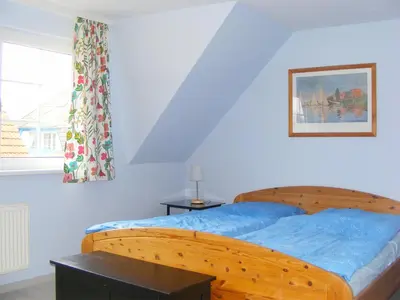 Ein Bett oder Betten in einem Zimmer der Unterkunft Mühlenpark 1 Mühlenpark Haus 2 Wo 7