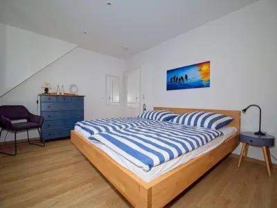 Ein Bett oder Betten in einem Zimmer der Unterkunft Mühlenpark 1 Mühlenpark Haus 4 Wo 16