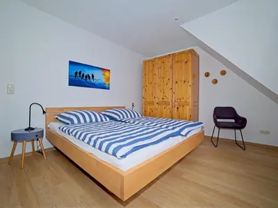 Ein Bett oder Betten in einem Zimmer der Unterkunft Mühlenpark 1 Mühlenpark Haus 4 Wo 16