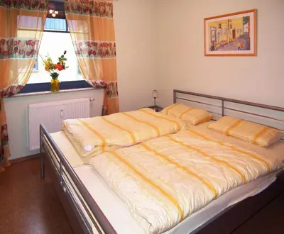 Ein Bett oder Betten in einem Zimmer der Unterkunft Grüne Str 36 h 