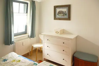 Ein Bett oder Betten in einem Zimmer der Unterkunft Eichenpark Haus 4 Wohnung 8