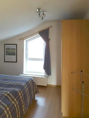 Ein Bett oder Betten in einem Zimmer der Unterkunft Haus Freya Wo 4