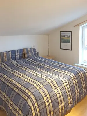 Ein Bett oder Betten in einem Zimmer der Unterkunft Haus Freya Wo 4