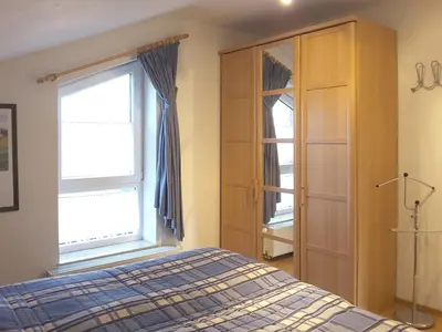 Ein Bett oder Betten in einem Zimmer der Unterkunft Haus Freya Wo 4