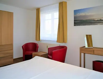 Ein Bett oder Betten in einem Zimmer der Unterkunft Haus 