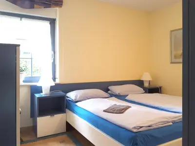 Ein Bett oder Betten in einem Zimmer der Unterkunft Eichenpark Haus 2 Wohnung 1
