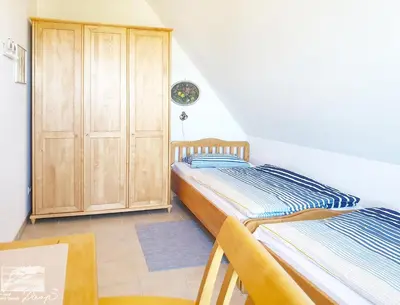 Ein Bett oder Betten in einem Zimmer der Unterkunft Haus an der Birke