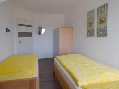 Ein Bett oder Betten in einem Zimmer der Unterkunft Im Grünnen Wo 3
