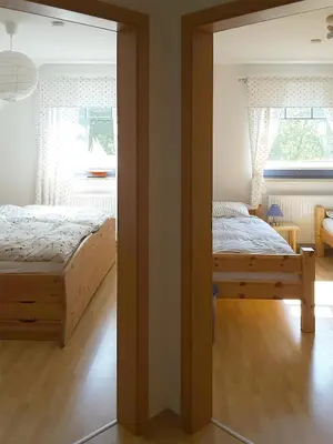 Ein Bett oder Betten in einem Zimmer der Unterkunft Haus Kormoran Wo 4