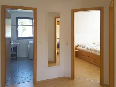 Ein Bett oder Betten in einem Zimmer der Unterkunft Haus Kormoran Wo 4