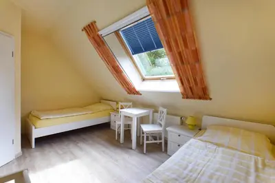 Ein Bett oder Betten in einem Zimmer der Unterkunft Ankerplatz RH 3