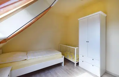 Ein Bett oder Betten in einem Zimmer der Unterkunft Ankerplatz RH 3
