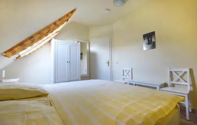 Ein Bett oder Betten in einem Zimmer der Unterkunft Ankerplatz RH 3