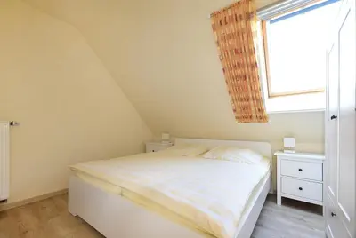 Ein Bett oder Betten in einem Zimmer der Unterkunft Ankerplatz RH 3