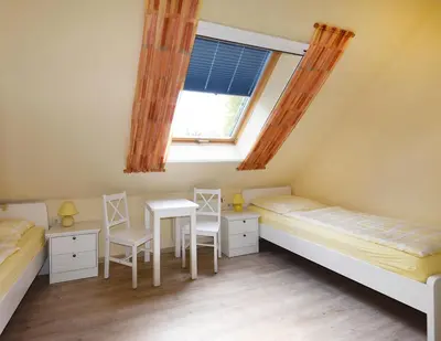 Ein Bett oder Betten in einem Zimmer der Unterkunft Ankerplatz RH 3