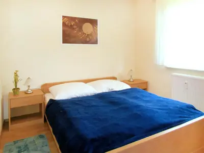 Ein Bett oder Betten in einem Zimmer der Unterkunft Südwiese
