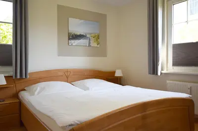 Ein Bett oder Betten in einem Zimmer der Unterkunft Buchengrund Wo 1