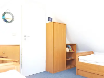 Ein Bett oder Betten in einem Zimmer der Unterkunft Buchengrund Wo 7