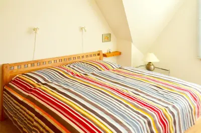 Ein Bett oder Betten in einem Zimmer der Unterkunft Eichenpark Haus 4 Wohnung 6