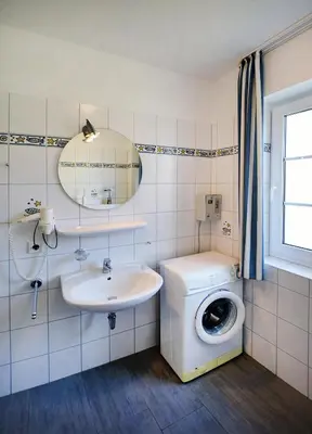 Ein Badezimmer in der Unterkunft Im Grünnen Wo 1