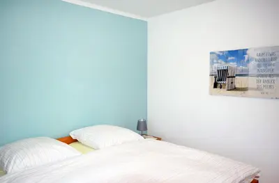 Ein Bett oder Betten in einem Zimmer der Unterkunft Im Grünnen Wo 1
