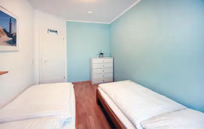 Ein Bett oder Betten in einem Zimmer der Unterkunft Im Grünnen Wo 1