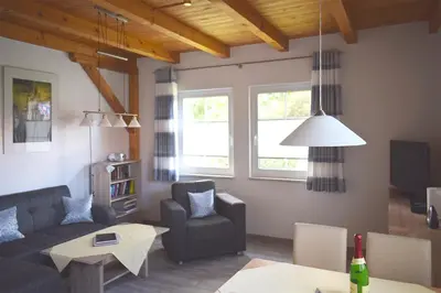 Ein Sitzbereich in der Unterkunft Ankerplatz RH 4
